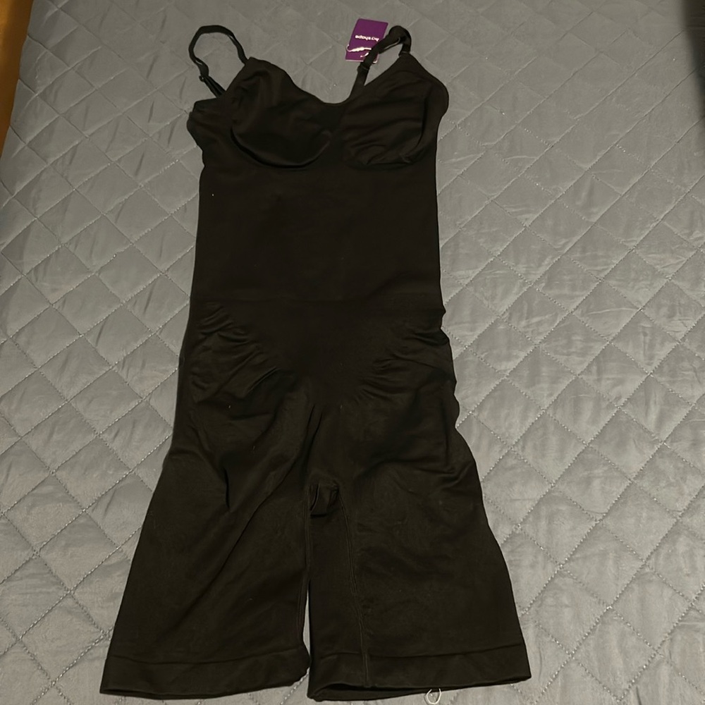 Brand new black with tags sculpting shapeware body suit.
